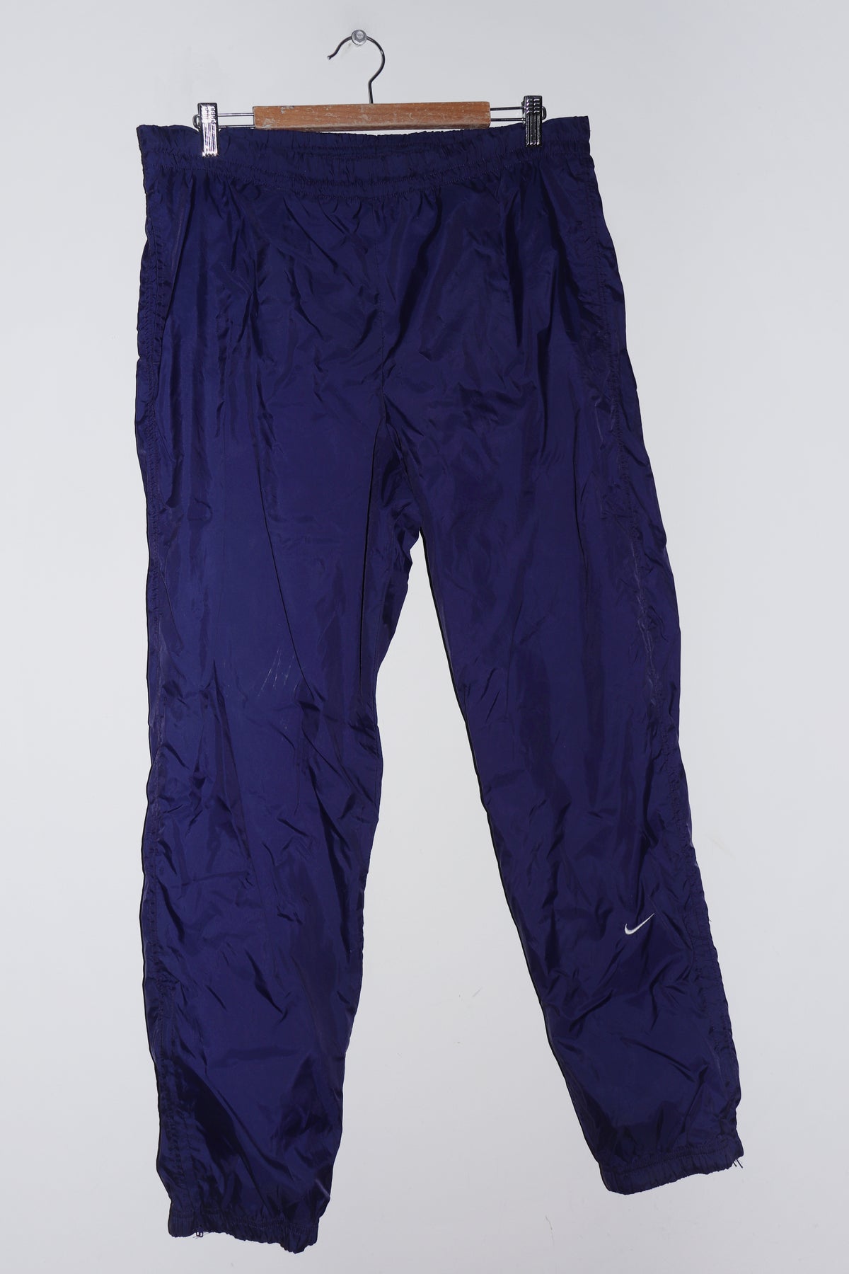 Vintage 90s Nike Embroidered Mini Swoosh Dark Blue Track Pants (28-30/8-10)