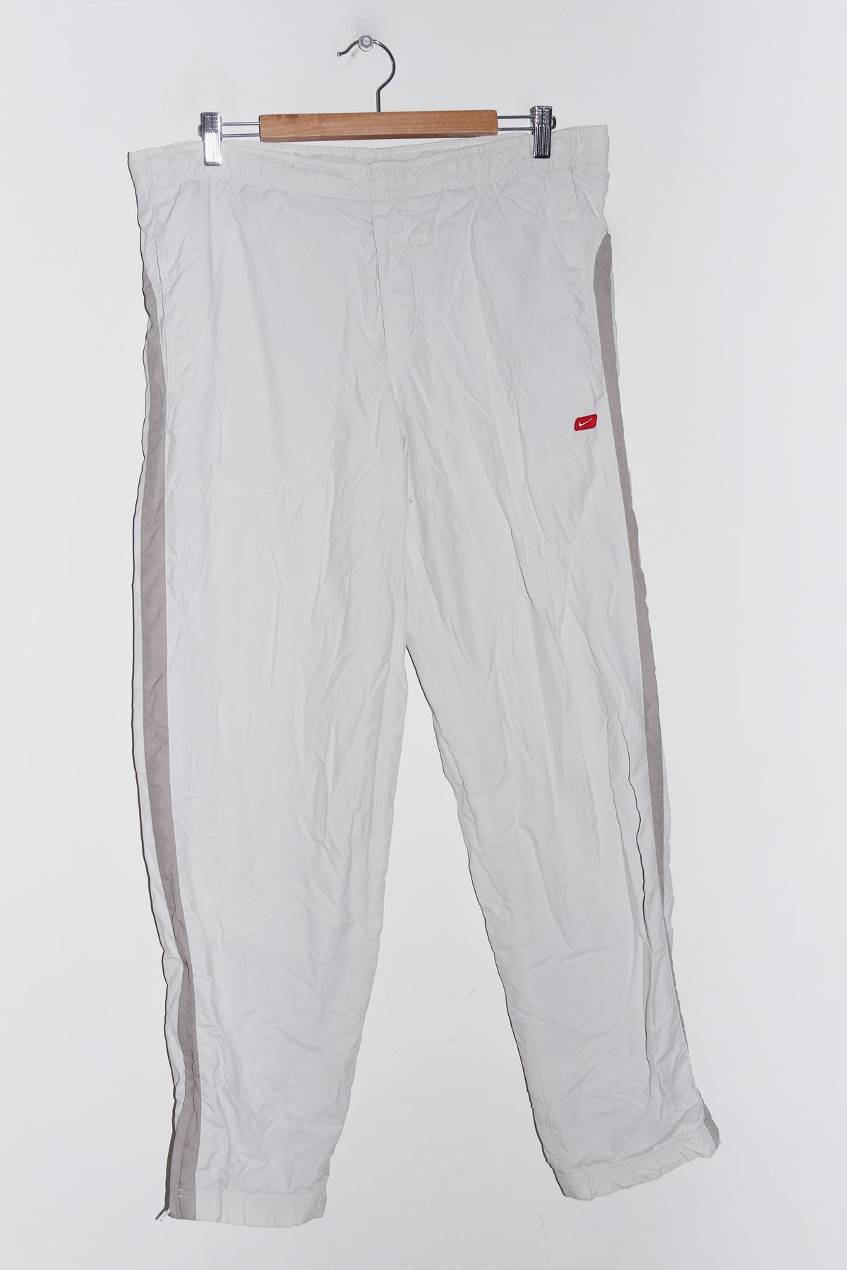 Vintage Nike Embroidered Mini Swoosh Baggy Cream Track Pants (30-32)