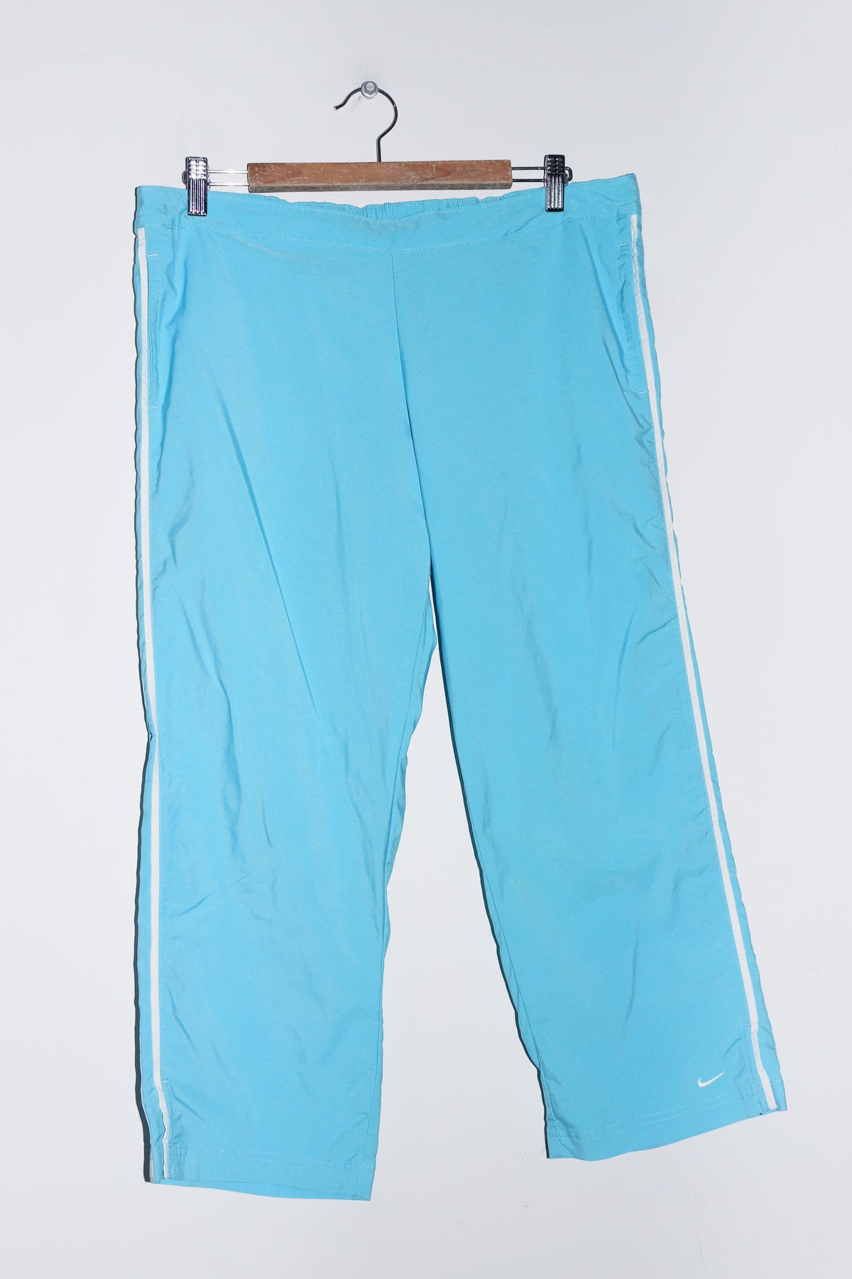 Vintage Nike Embroidered Mini Swoosh Light Blue 3/4 Track Pants (12-14)