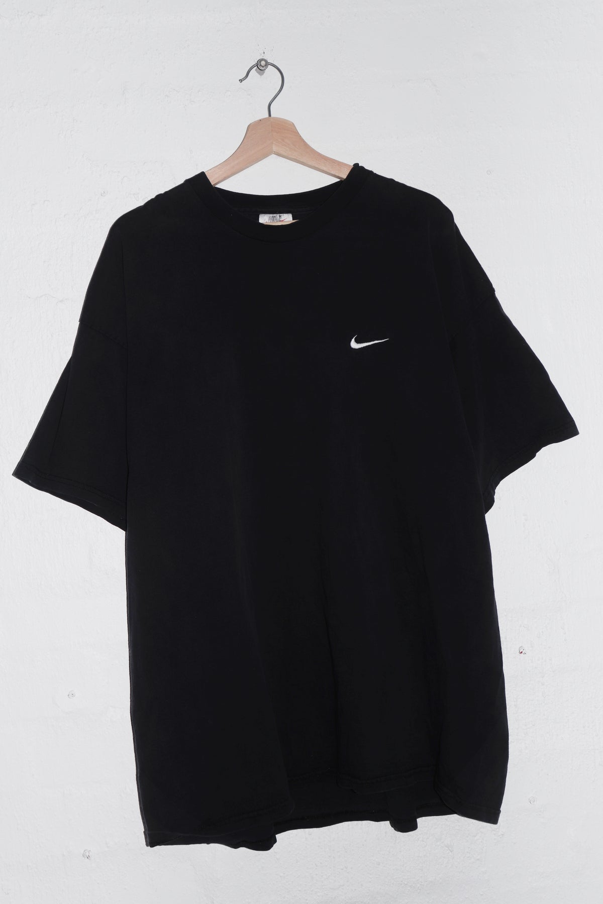 Vintage 90s USA Nike Embroidered Mini Swoosh Faded Black Tee (XL)
