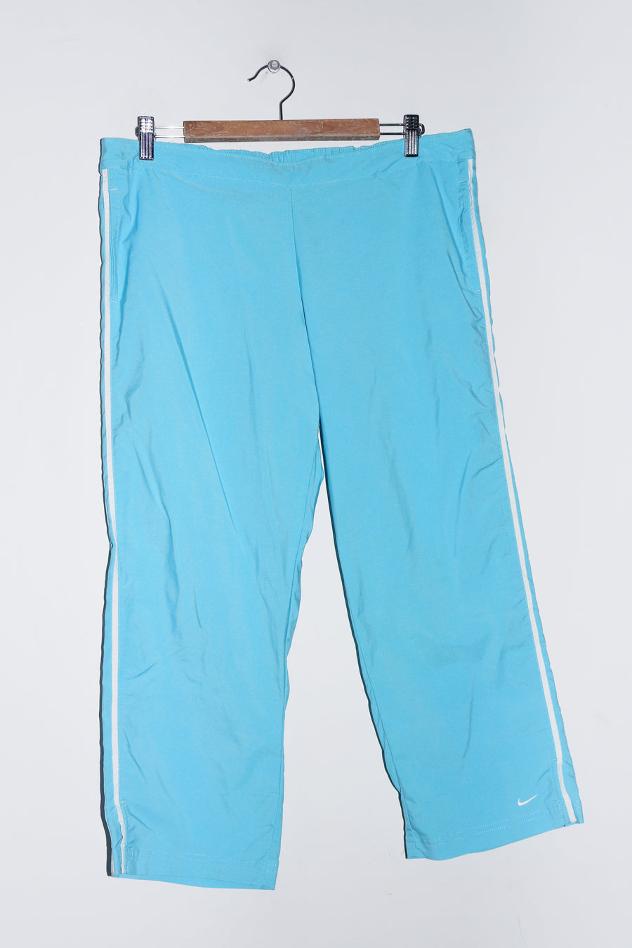 Vintage Nike Embroidered Mini Swoosh Light Blue 3/4 Track Pants (12-14)